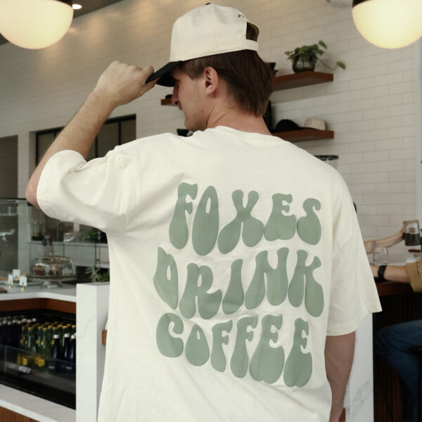 hatblkneu_tsneu Neutral Color with Green Foxes Drink Coffee T-shirt